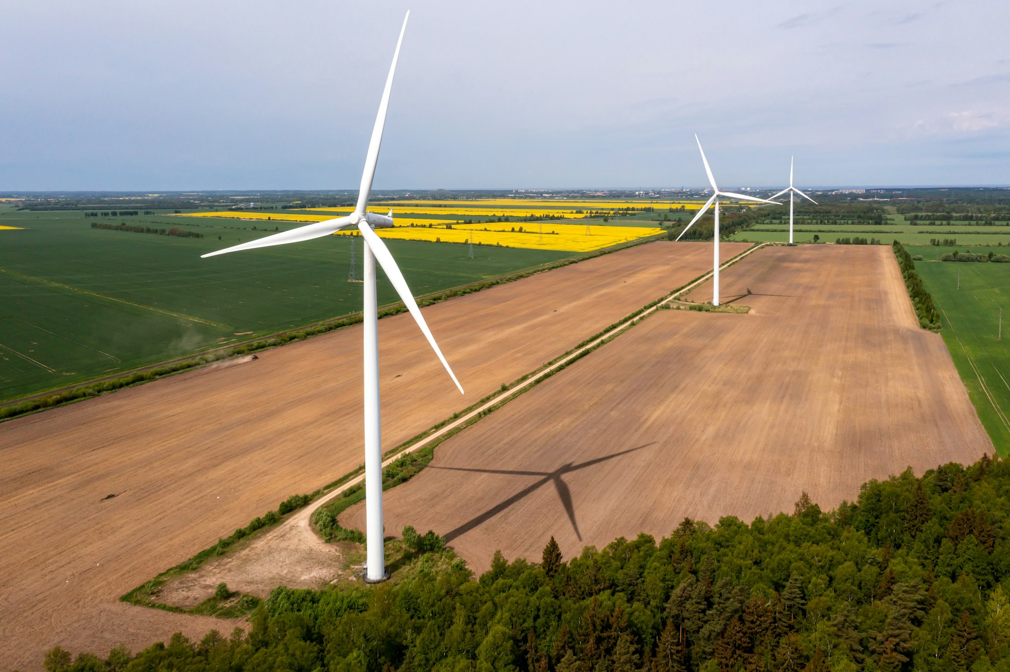 aerial view of wind turbines farm, sustainable and clean electric power, future of renewable energy